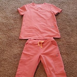 Pair of Yola pants, Caratina top coral